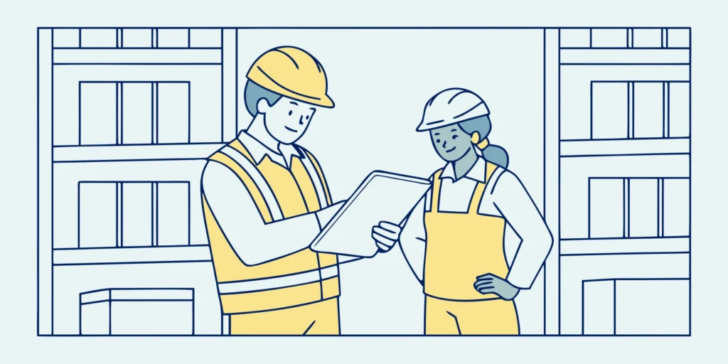 Two restoration professionals reviewing a contents inventory on a tablet in a modern storage facility